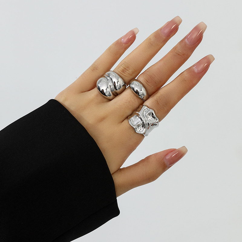 Estilo explosivo transfronterizo europeo y americano, gota de agua brillante, abrazo, anillo abierto, pliegues de metal líquido, anillo cruzado irregular image 10