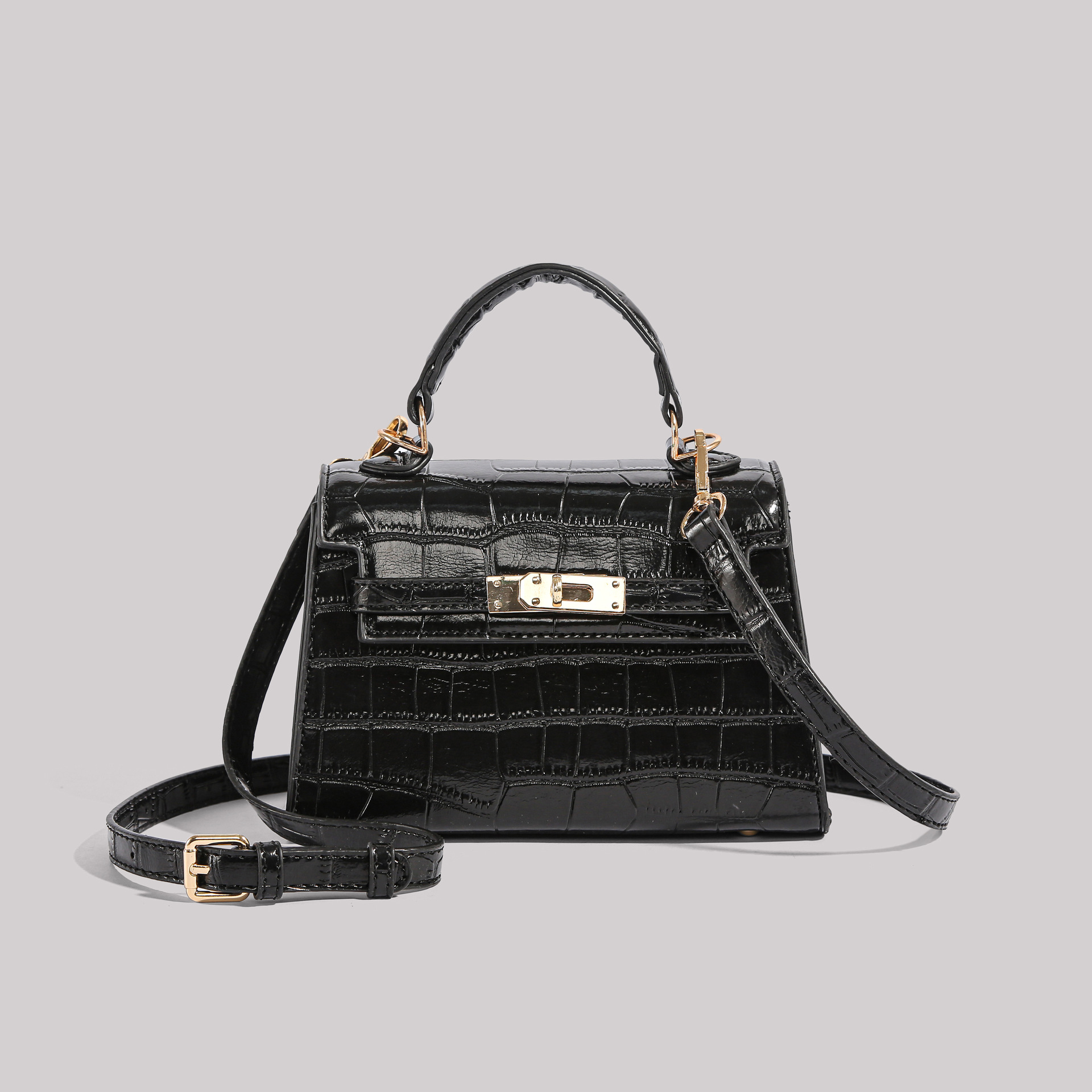 Los fabricantes venden directamente el nuevo bolso Kelly simple en 2025 con un bolso cuadrado pequeño y un bolso con patrón de cocodrilo.