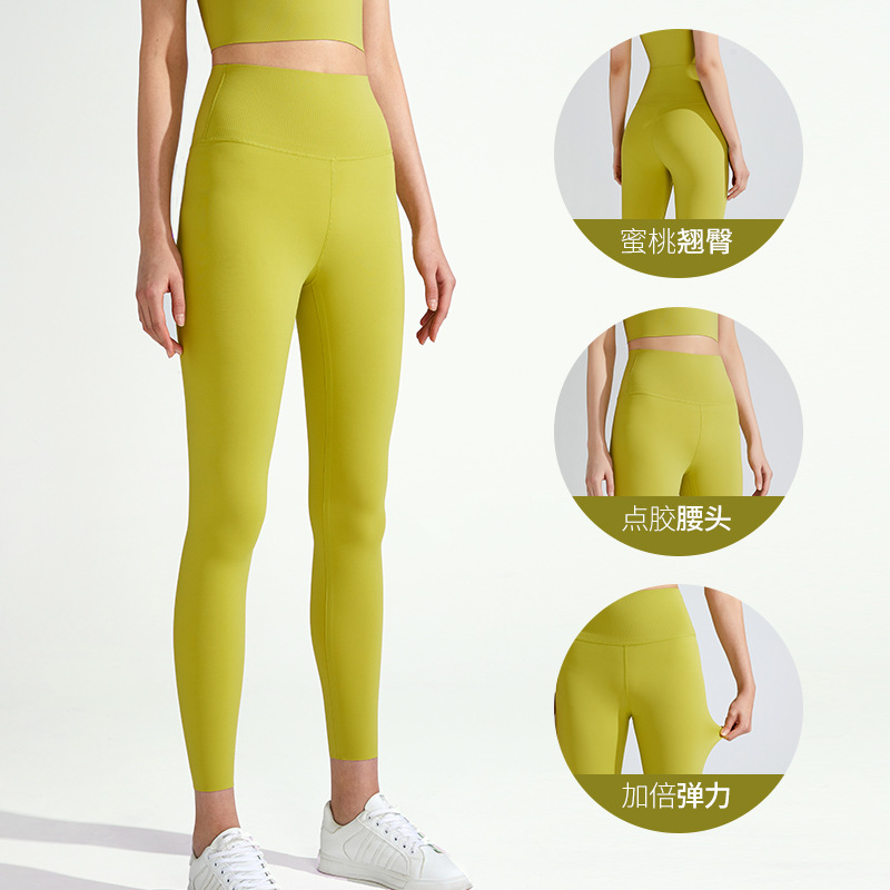 Transfronteriza nuevos pantalones de yoga Lycra ajuste sin costuras de las mujeres pantalones de fitness de secado rápido Peach Hip Levantamiento de cintura alta ropa de yoga desnuda