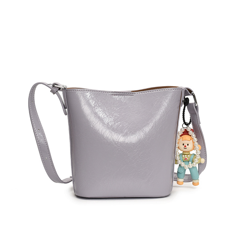 Bolso de cubo de tendencia simple y de alto nivel para mujer 2025 nuevo bolso de hombro casual de moda bolso de mensajero de cercanías