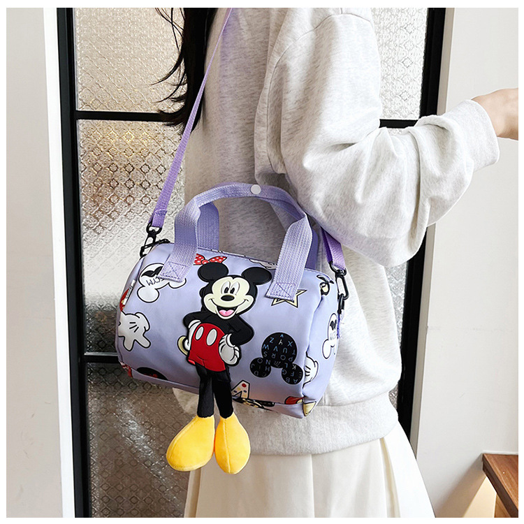 In 2024, the best-selling children's bags will feature cute Mickey Mouse-patterned bowling bags for girls, casual hand-held shoulder bags, and a unique style undefined