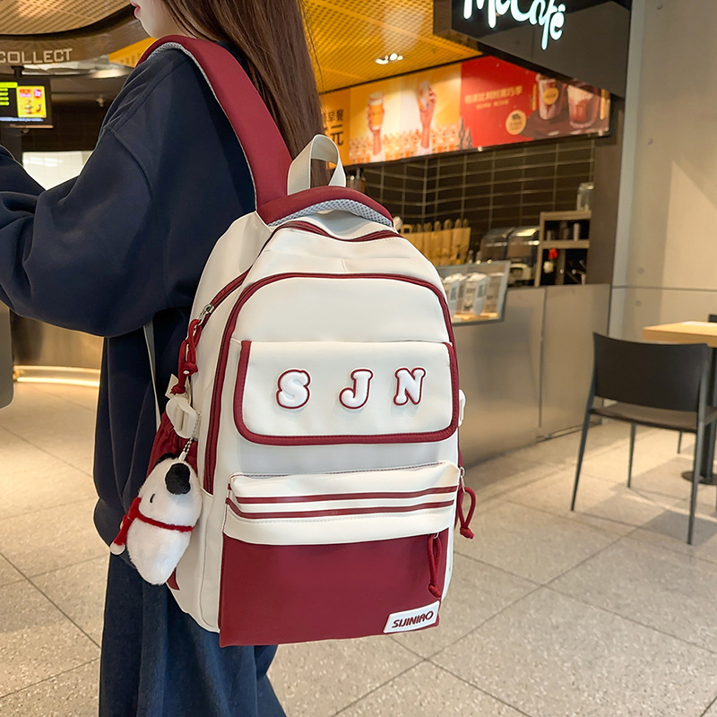 Nueva mochila escolar de gran capacidad, mochila de moda para estudiantes de secundaria coreana, mochila de pareja de estudiantes universitarios de estilo universitario de todo fósforo