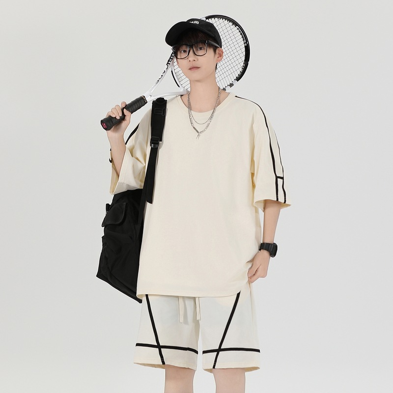 Fábrica de fuente personalizable logotipo de verano niño cuello redondo suelto camiseta de manga corta pantalones cortos trajes deportivos casuales para hombres