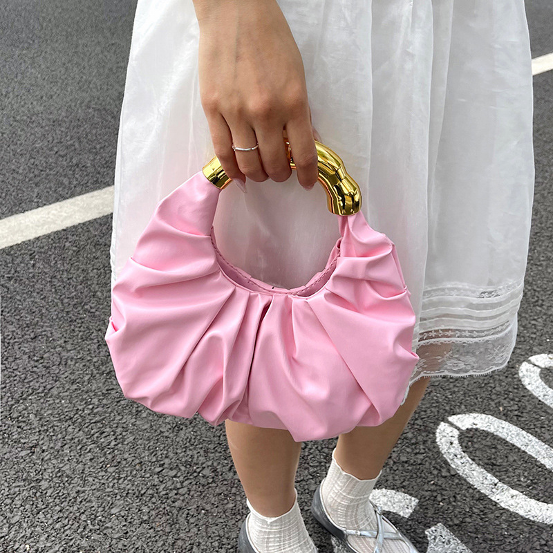 Nuevo bolso de color sólido PU bolso de nube popular bolso de moda plegado nicho de diseño bolso de mano temperamento bolsa de cena de dama