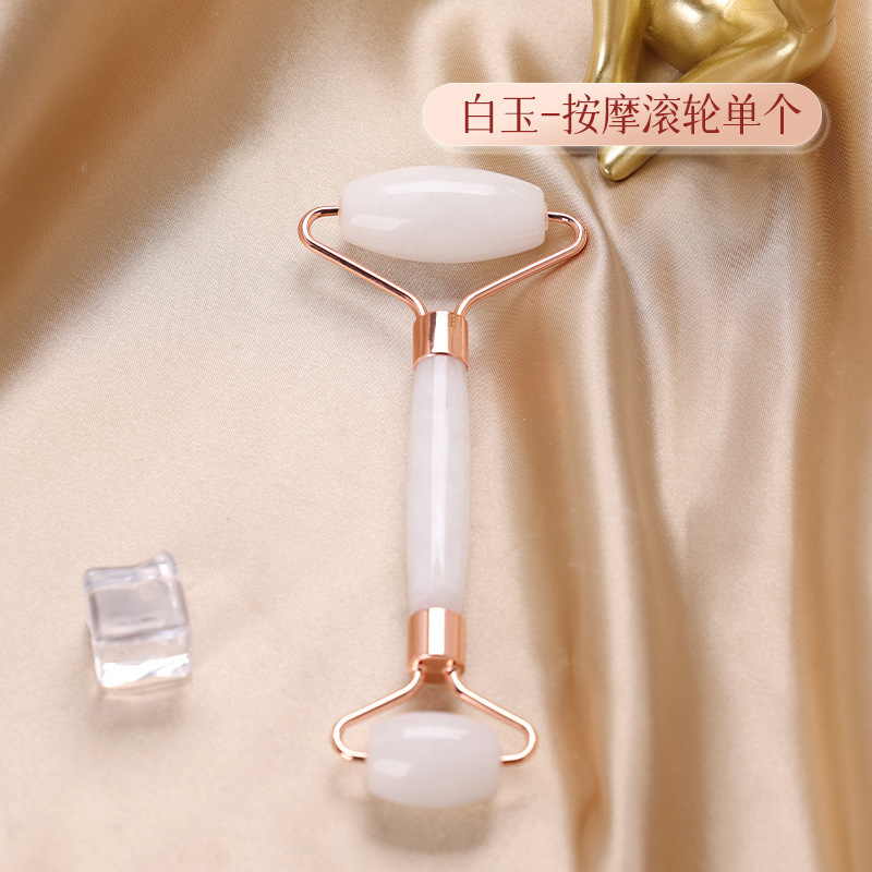 顔のマッサージのローラーの器具のボールの神器の天然の玉の粉の結晶のやせている顔の女性の手動は美容の顔を引きます|undefined