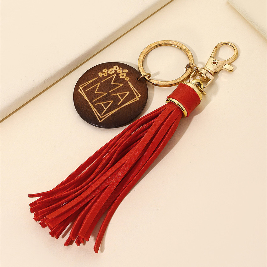 17g Weight Keychain Classification 1 Piece Quantity Casual, Holiday, Daily Occasion Pu Leather Material Mother'S Day Festival Letter, Tassel Pattern Unisex Gender Modern Style Style Modern Style Letter Tassel Pu Leather Mother'S Day Unisex Keychain 38