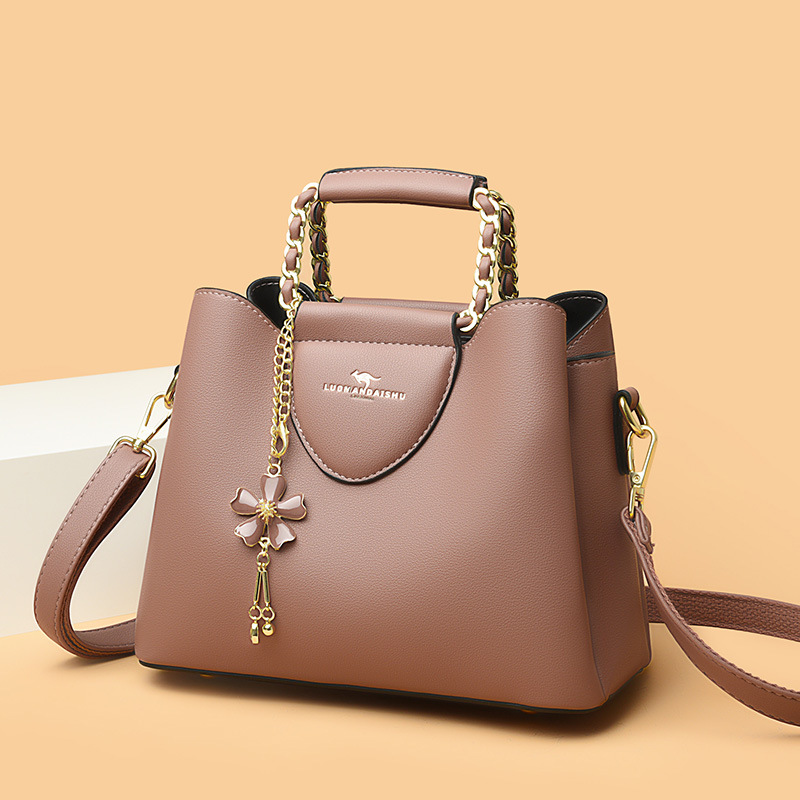 Nueva moda de hombro de las mujeres costura pequeño tamaño exquisito cubo bolsa de gran capacidad de cuero suave de una sola pieza de entrega para mamá más joven