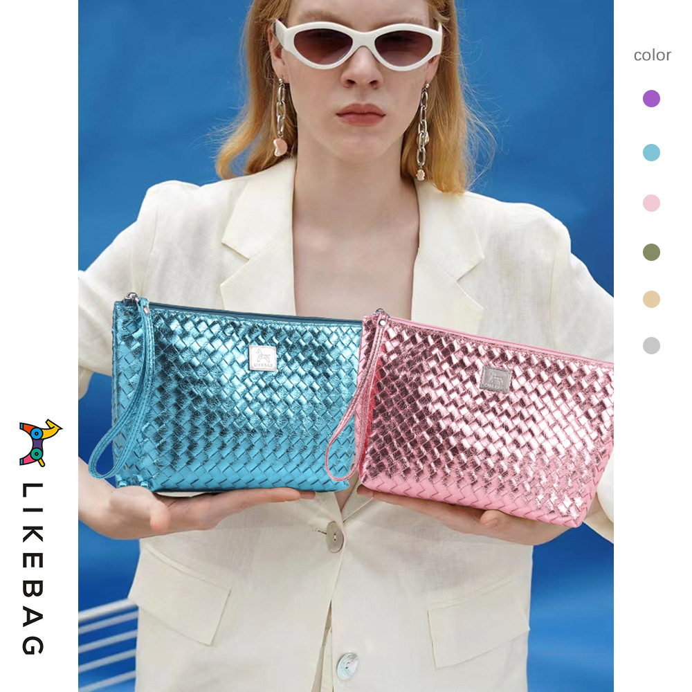 Bolsa de cosméticos de mano transfronteriza europea y americana bolsa de viaje tejida de moda bolsa de almacenamiento portátil bolsa de lavado logo puede ser añadido