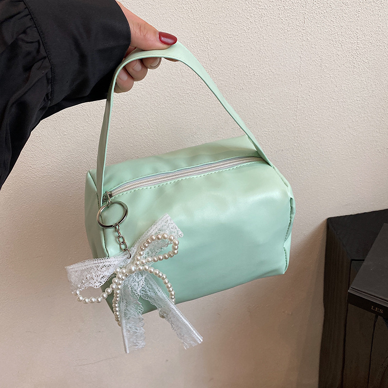 Nicho Zhong fresco dulce bolso de braza para mujeres 2025 primavera y verano nuevo estilo de alta calidad de moda de viaje de hombro bolso de mujer estilo extranjero