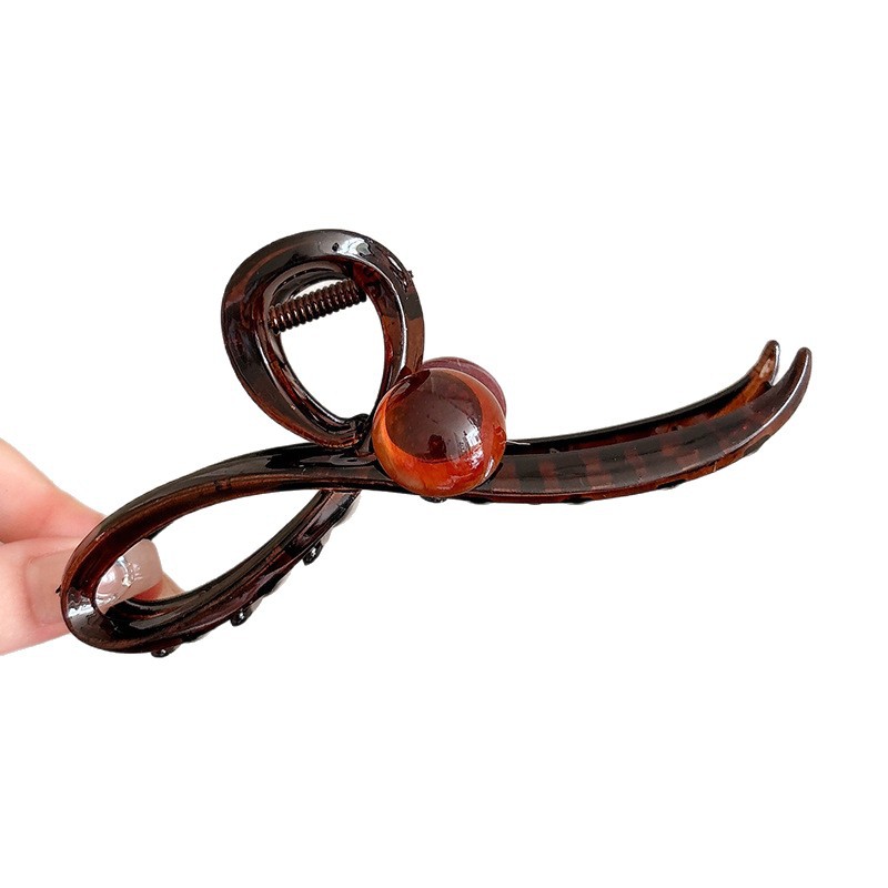 Clip de agarre de temperamento de alta calidad de lujo ligero para mujer 2025 nueva horquilla en la parte posterior de la cabeza con mucho volumen de cabello clip de tiburón tocado horquilla