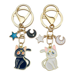 漫画ぼんやり萌えかわいい猫のキーホルダーかわいい合金の月の星の猫の鍵のペンダントのリュックサックのアクセサリー