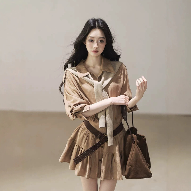 AOMALM, a brand known for its stylish and sophisticated designs, presents a collection of dresses and shirts for women, including a fall collection featuring a short, collared shirt dress that evokes the image of "wandering through golden wheat fields."