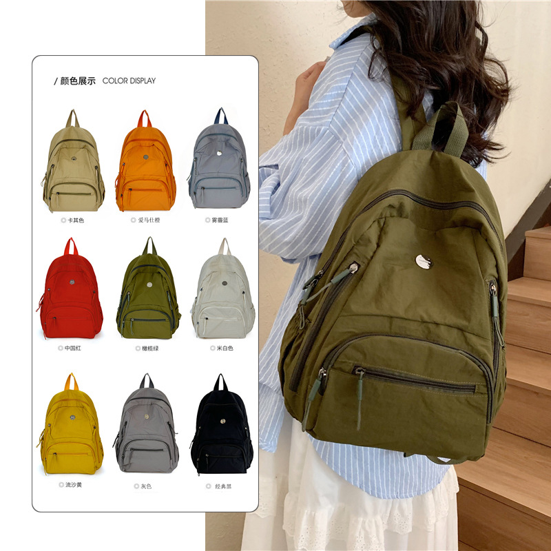 Foreign trade solid color simple lightweight backpack for female college students, portable travel water-resistant casual travel backpack