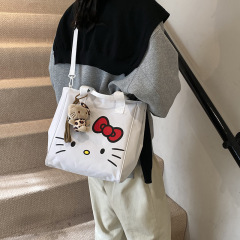 かわいい猫のハンドバッグの女性の新しい大容量のトートバッグのファッションの百合ナイロンの肩の斜め掛けの通勤のカバン