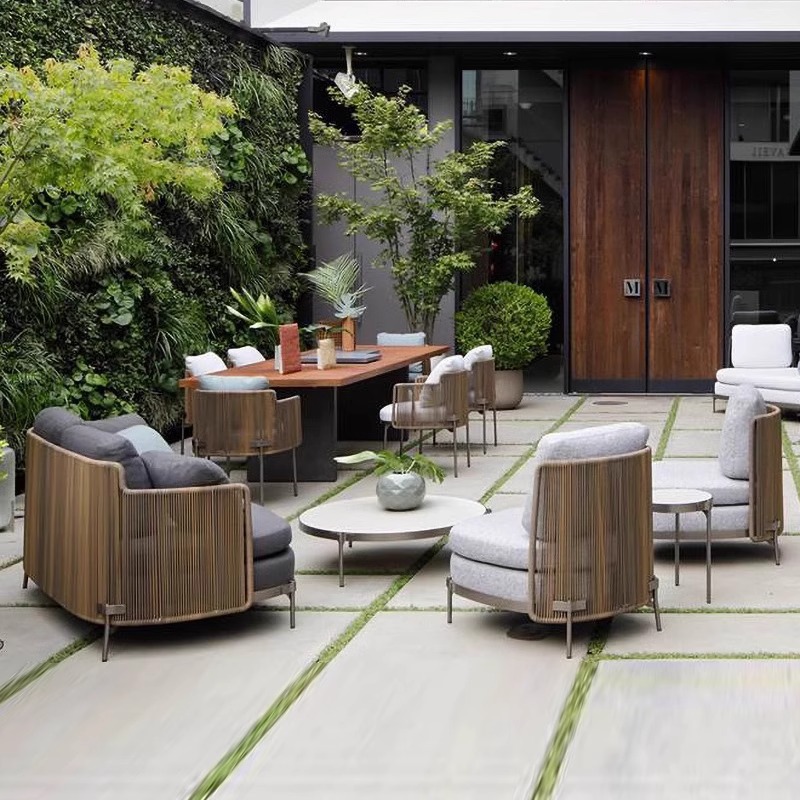 Combinación de sofá de ocio nórdico Patio al aire libre Villa Impermeable Sunscreen Garden Sunshine Room Muebles de ratán al aire libre