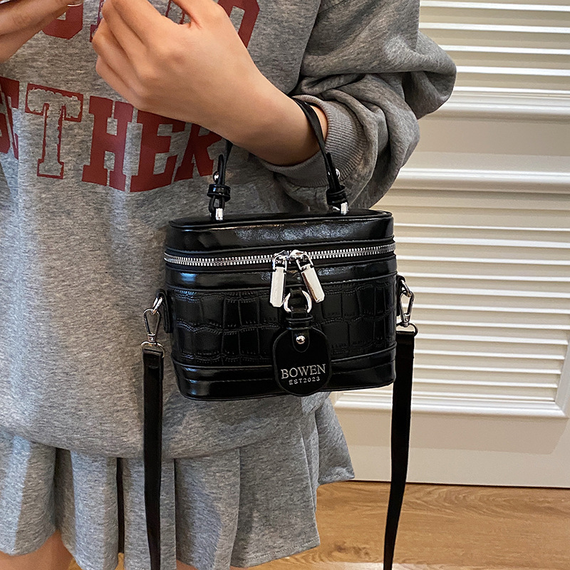 Bolso de textura transfronteriza 2025 primavera nuevo bolso femenino personalizado bolso de hombro con patrón de piedra bolso de mensajero de color de contraste de moda