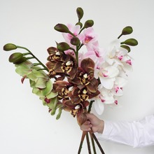 工厂直销仿真8头蕙兰花高档手感假花婚庆花艺家居出口外贸装饰花