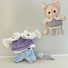 15センチの玲娜貝児は服をストラップしています。