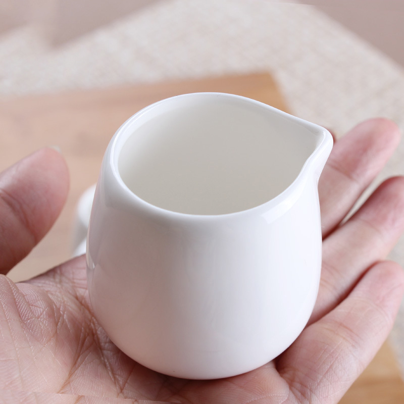 小さいミルクの杯の陶磁器のミニのミルクの缶の蜂蜜のミルクの杯のコーヒーのミルクの瓶のミルクのスプーンのヨーロッパ式のステーキのジュースの砂糖の缶|undefined
