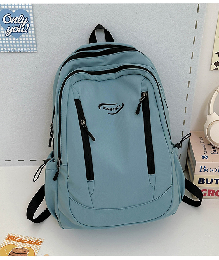 Fabricantes de mochilas escolares, estudiantes universitarias al por mayor, simples y versátiles, versión coreana de mochilas de ocio de nicho engrosadas