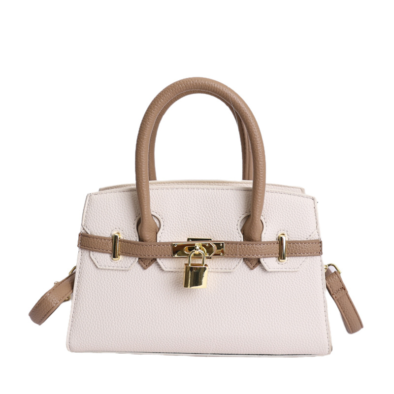 Coreano simple bolso de mano mujer 2026 primavera nueva bolsa de viaje diario texturizada bolso de mochila