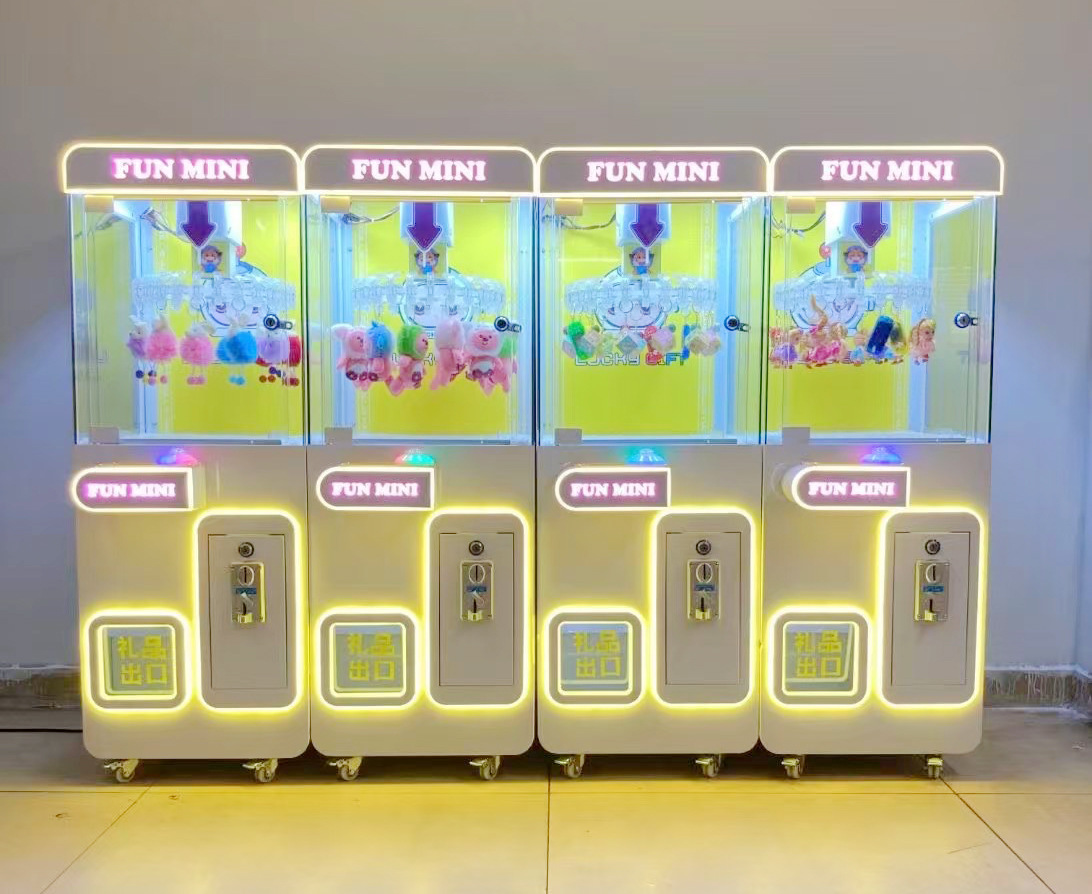 El nuevo fabricante de la fuente de la máquina de clip utiliza monedas para mayoristas, pegatinas para niños, clips para bocadillos, máquina de regalo, máquina de garras