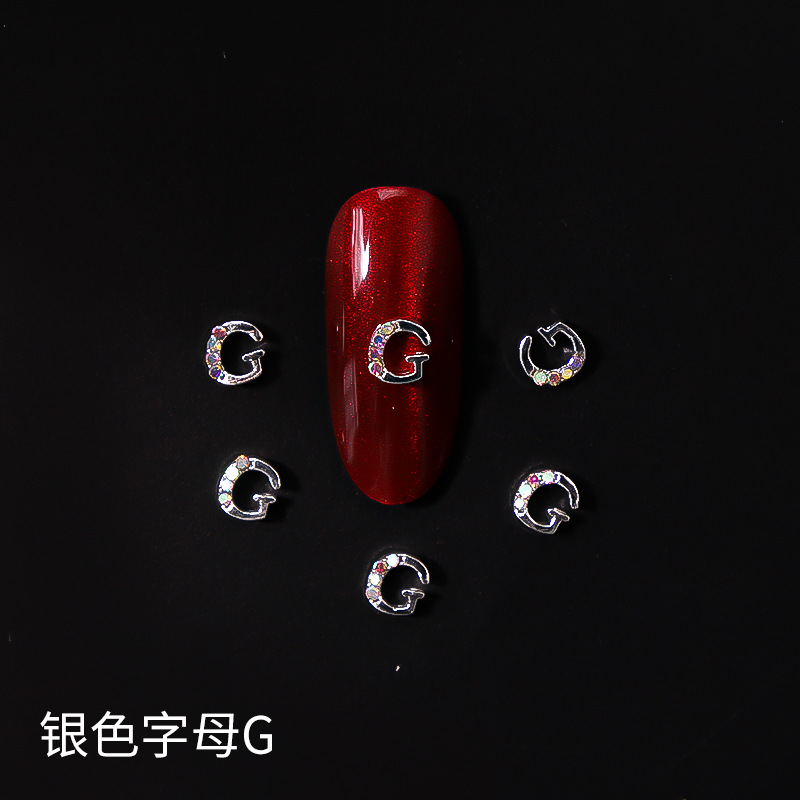 Nueva LZ manicura 26 letras aleación joyería estilo japonés Internet celebridad plata letras manicura joyería clavo Taladro