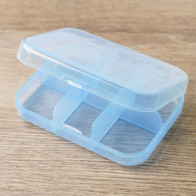 Caja de medicamentos portátil al por mayor de fábrica, caja de PP para el hogar, caja de medicamentos dividida para 7 días, caja sellada a prueba de olores, caja de medicamentos transparente portátil