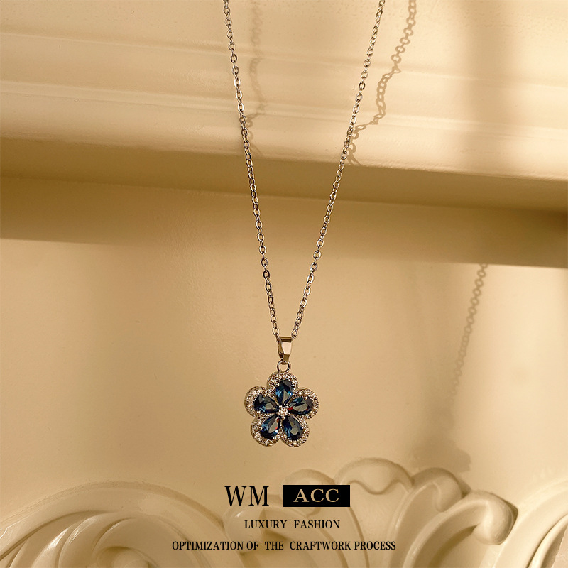 Aguja de plata azul aretes de flor de zircón estilo ligero de lujo estilo alto collar nuevo aretes al por mayor image 3