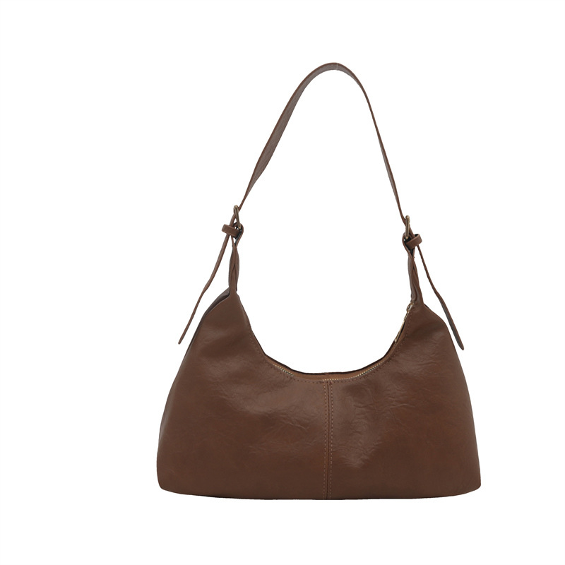 Bolsa coreana de seda texturizada 2024, nuevo nicho de diseño, bolso de palo, bolso de hombro retro de cuero pu.