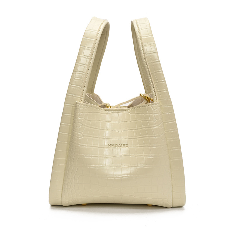 Bolso de cubo de mano de estilo explosivo con patrón de cocodrilo transfronterizo para mujer 2025 nuevo bolso de hombro con textura versátil bolso de mensajero súper caliente