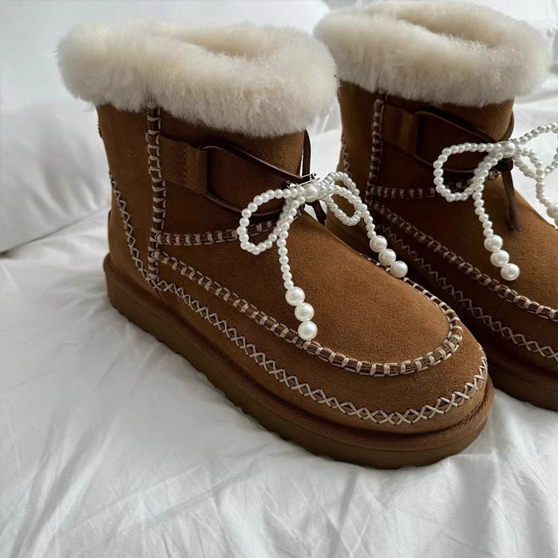 Botas de nieve botón de invierno nuevo arco de perlas zapatos de fichaje flor zapatos deportivos decoración mujer
