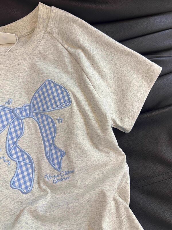 韓国風偽ツーピース半袖Tシャツ女性用夏小柄コントラストストライプスプライシングリボントップ卸売|undefined