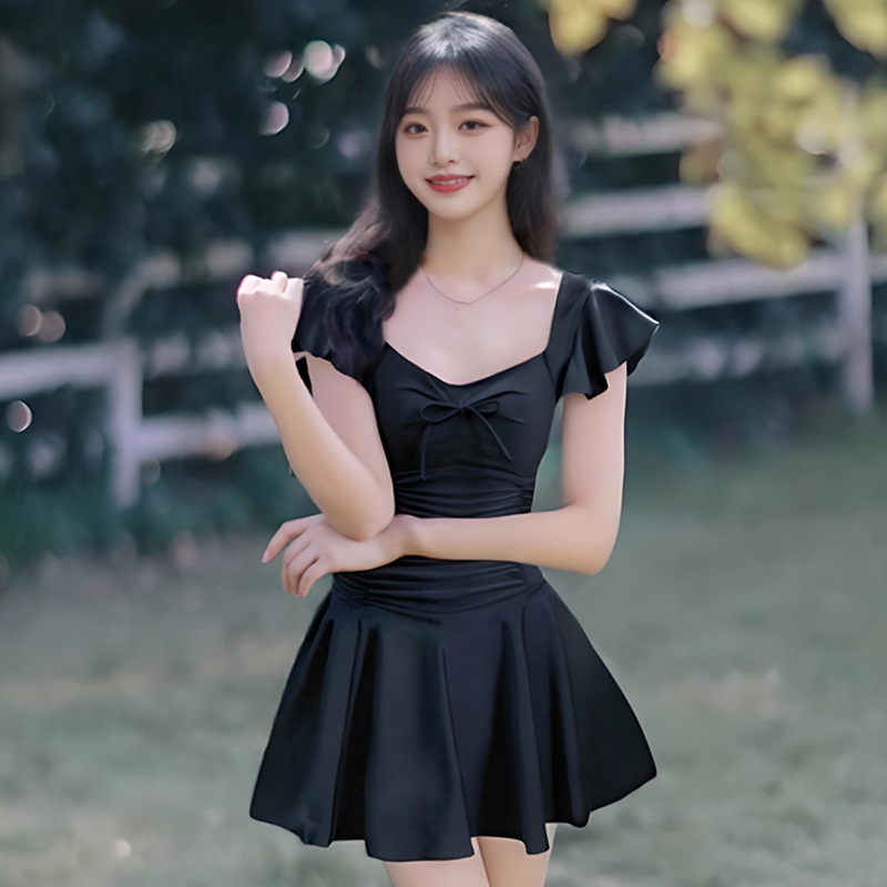 Traje de baño de una pieza para mujer 2025 nuevo color sólido dulce y lindo conservador ligeramente gordo que cubre la carne traje de baño de vacaciones de aguas termales al por mayor