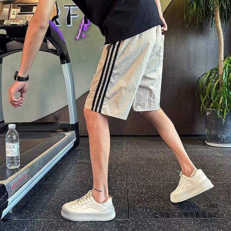 Men's shorts buy one get one free summer Hong Kong style striped quick-dry knee-length shorts 2026 new thin sports beach shorts Men's shorts buy one get one free summer Hong Kong style striped quick-dry knee-length shorts 2026 new thin sports beach shorts