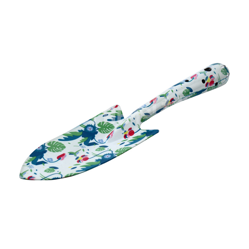 Herramientas al aire libre textura de impresión de flores pequeñas herramientas de jardín conjunto de tres piezas de impresión pala jardín flores y plantas herramientas de jardinería