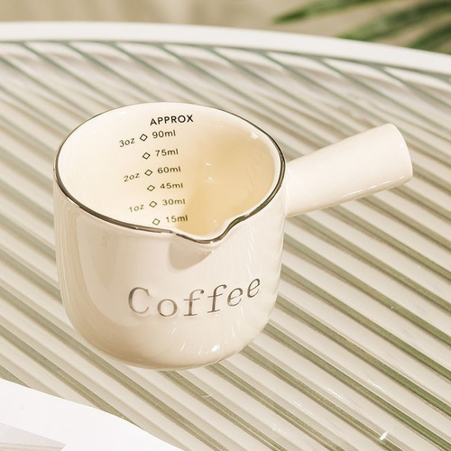 Highly stylish Italian-style espresso cup with measurements, crafted from premium, delicate ceramic—perfect for precise coffee brewing and serving.