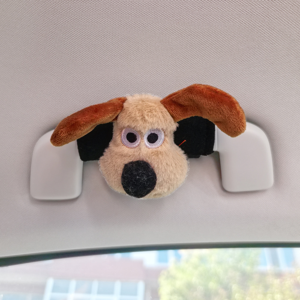 Perro de peluche maneja de automóvil maneja de automóvil masculino y femenino maneja de puerta interior cubierta guante de techo