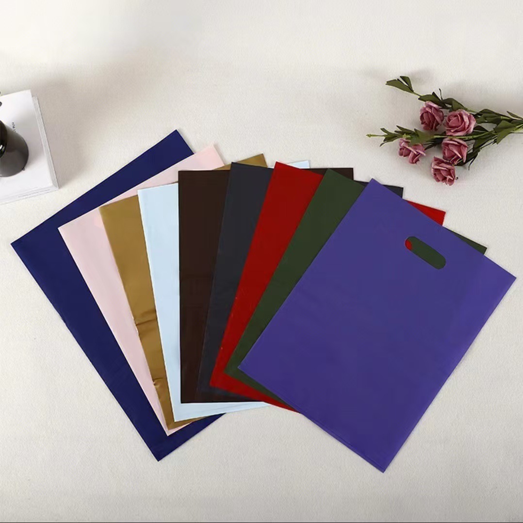 Clothing Store Bag Packaging Bag Plastic Bag Handbag Clothes Pe Flat Mouth Cosmetics Gift Shopping Bag Four-Finger Bag