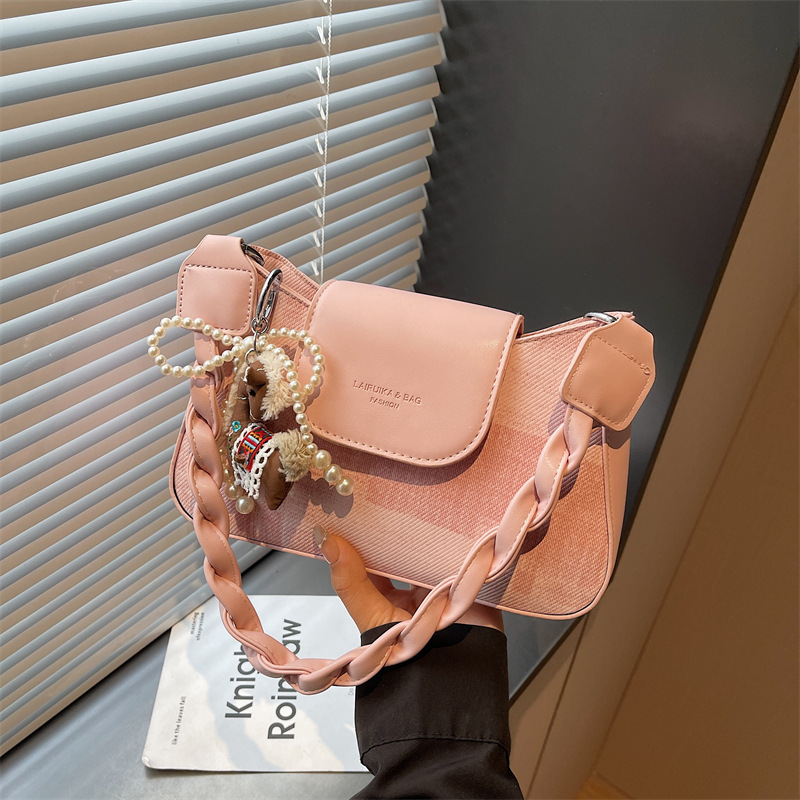 Retro bolso pequeño para mujeres 2026 nueva moda de hombro simple bolso de mochila diaria de textura nicho bolso de mano
