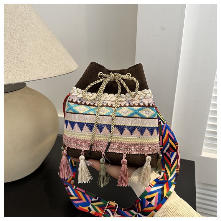 Women's Medium Canvas Geometric Ethnic Style Tassel String Bucket Bag display picture 26