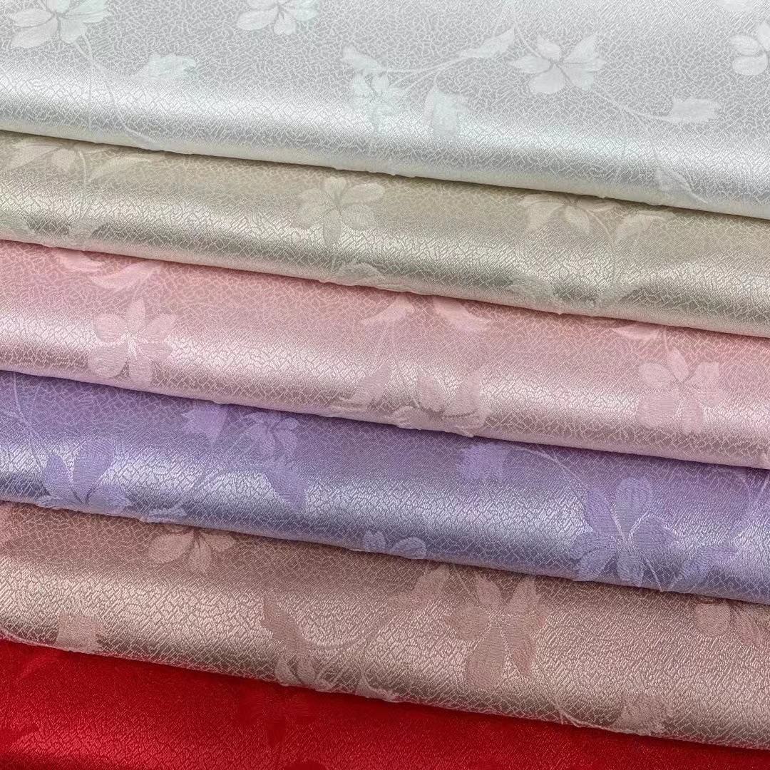 厂家现货直销提花叶子花时尚连衣裙套装古装旗袍汉服帽子箱包面料