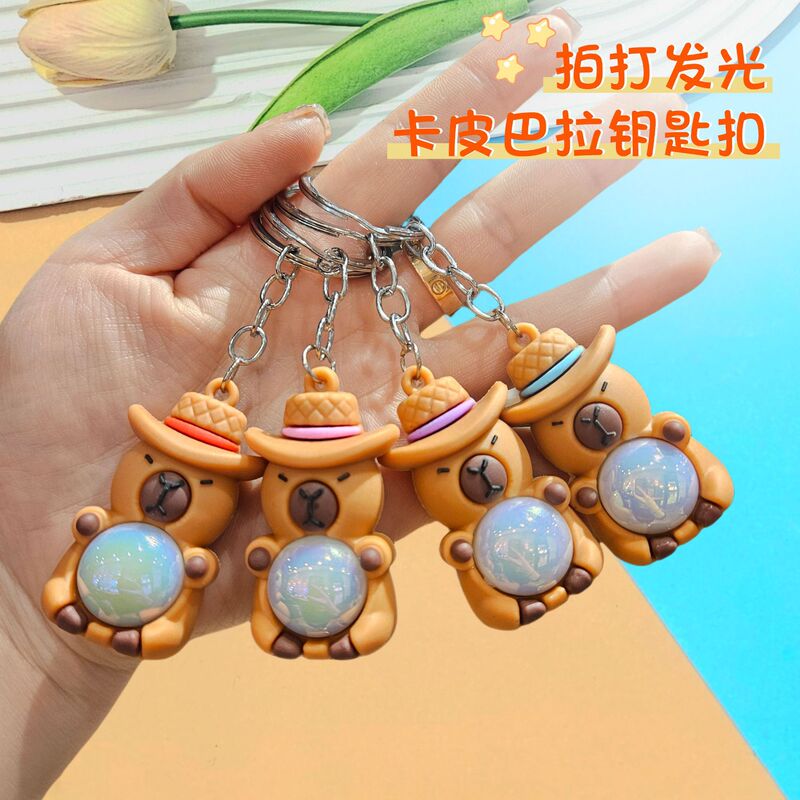 New creative flashing light kapi bala key chain pendant car bag key chain hanging decoration push blind box gift New creative flashing light kapi bala key chain pendant car bag key chain hanging decoration push blind box gift