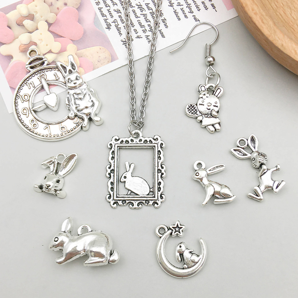 2g Weight Pendant Jewelry Making Type 17*24mm Jewelry Making Size DIY Jewelry Accessories Classification 11 Models, 2 Each, 22/Bag Quantity Zinc alloy Material Rabbit Pattern Polished Finish Plating Design Cute Style 11 Models, 2 Each, 22/Bag 17*24mm Zinc Alloy Rabbit Polished Pendant 2