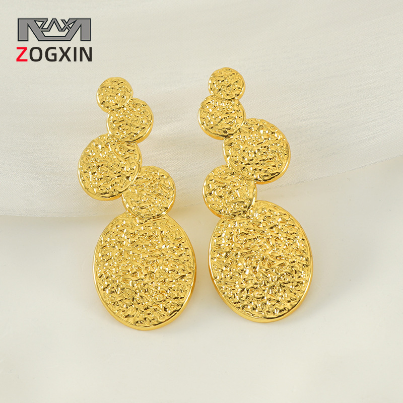 Diseño transfronterizo europeo y americano, pendientes de acero de titanio de moda chapados en oro de 18 quilates de acero inoxidable de lava INS viento