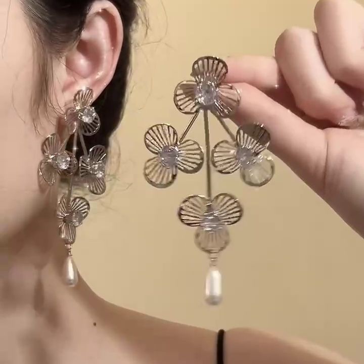 Pendientes de camelia de simulación de aguja de plata Pendientes elegantes retro francés Pendientes de todo fósforo de moda personalizada