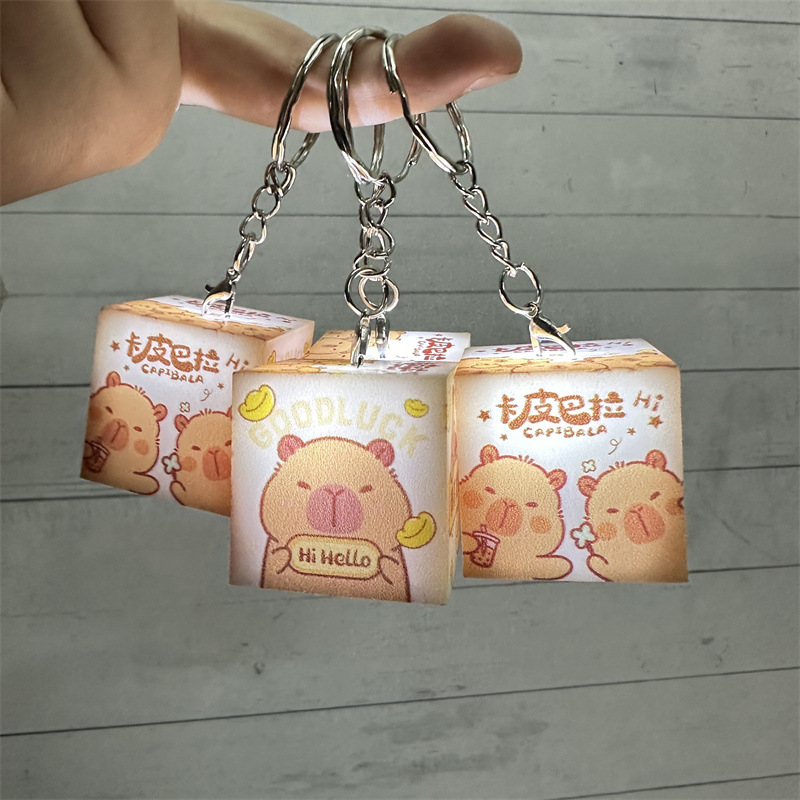 外贸卡皮巴拉发光钥匙扣佛系水豚带灯挂饰豚豚崽闪灯包包挂件礼品