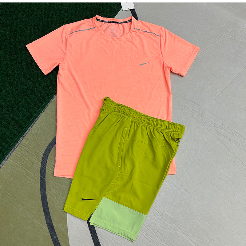 Mayorista nuevo juego de comercio exterior deportivo fitness juego de carrera rápida secado transpirable suelto ocio pantalones cortos de manga corta ropa de hombre