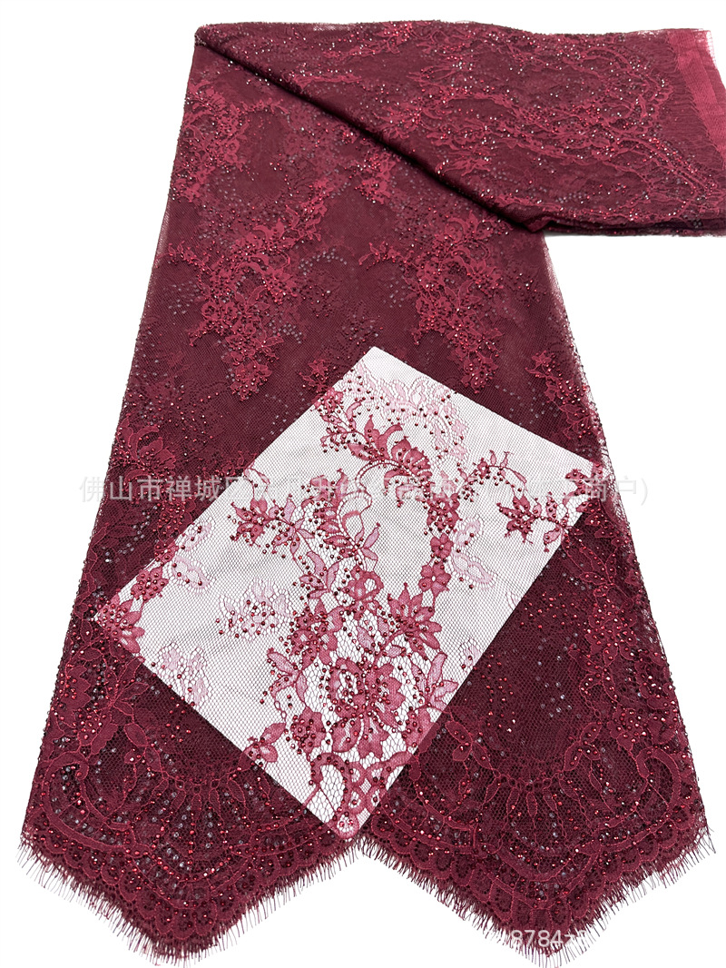 Tejido de malla de pestañas de encaje caliente flor retro hecha a mano verde diamante de cola de pez vestido de noche tela de boda en stock