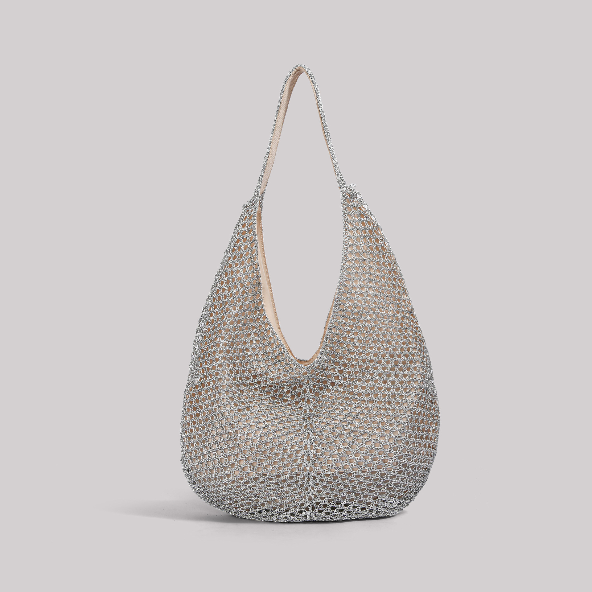 Bolsas de brazo retro coreanas diarias trenzadas mujeres verano 2026 gran capacidad de moda universal agujerado bolsas de hombro de moda